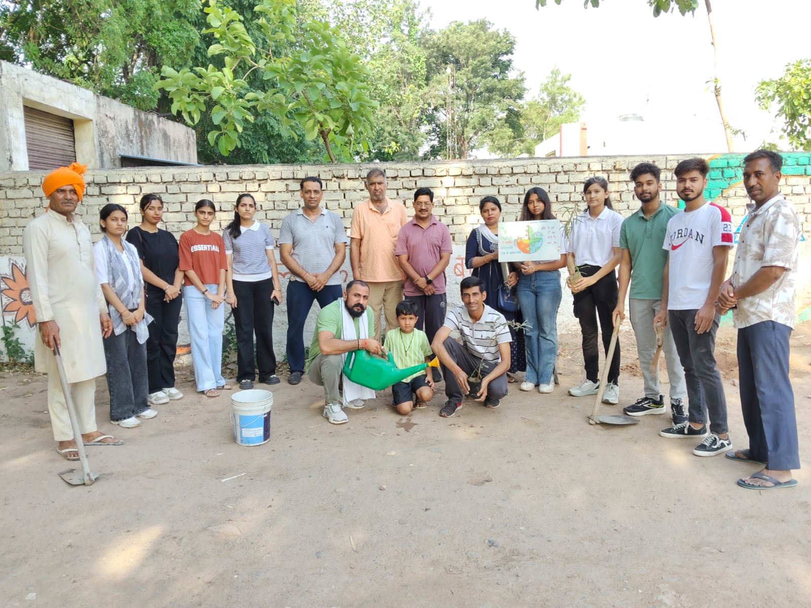 Volunteers planting saplings